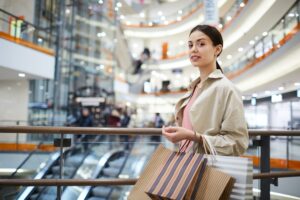 Beautiful lady shopaholic in mall