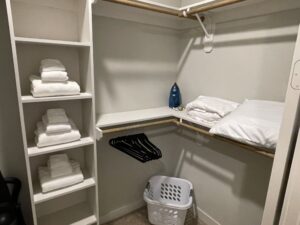 Bedroom Closet within Corporate Apartments in Stone Oak, San Antonio, TX