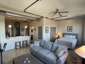 Bedroom, Living Room and Kitchen within San Antonio Corporate Housing Apartments