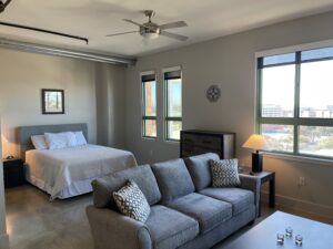 Bedroom and Couch within San Antonio Corporate Apartments