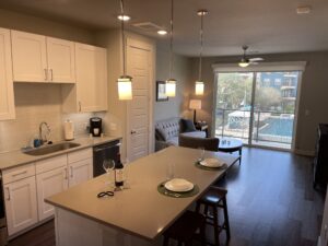 Kitchen and Patio within Corporate Apartments in Stone Oak, San Antonio, TX